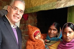 Peter with a mother and child in Bihar